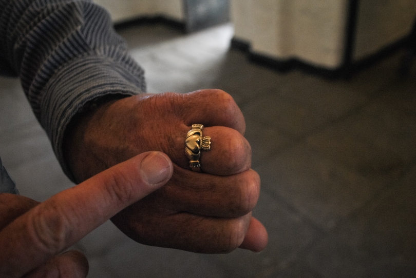 My tour guide at Kilmainham Gaol points out his gold Claddagh wedding ring, describing that if the heart points inward, it means his heart is taken. If it point outward, his heart is available. He said his wife wears one, too.